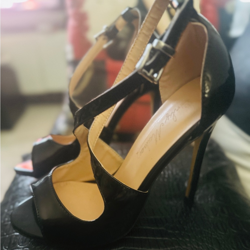 Black stiletto criss cross front heels